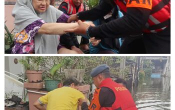 Tim Sar Batalyon C Pelopor Sat Brimob Polda Metro Jaya Evakuasi warga terdampak banjir Menuju TPS di Perumahan Griya kencana Ciledug Tangkot